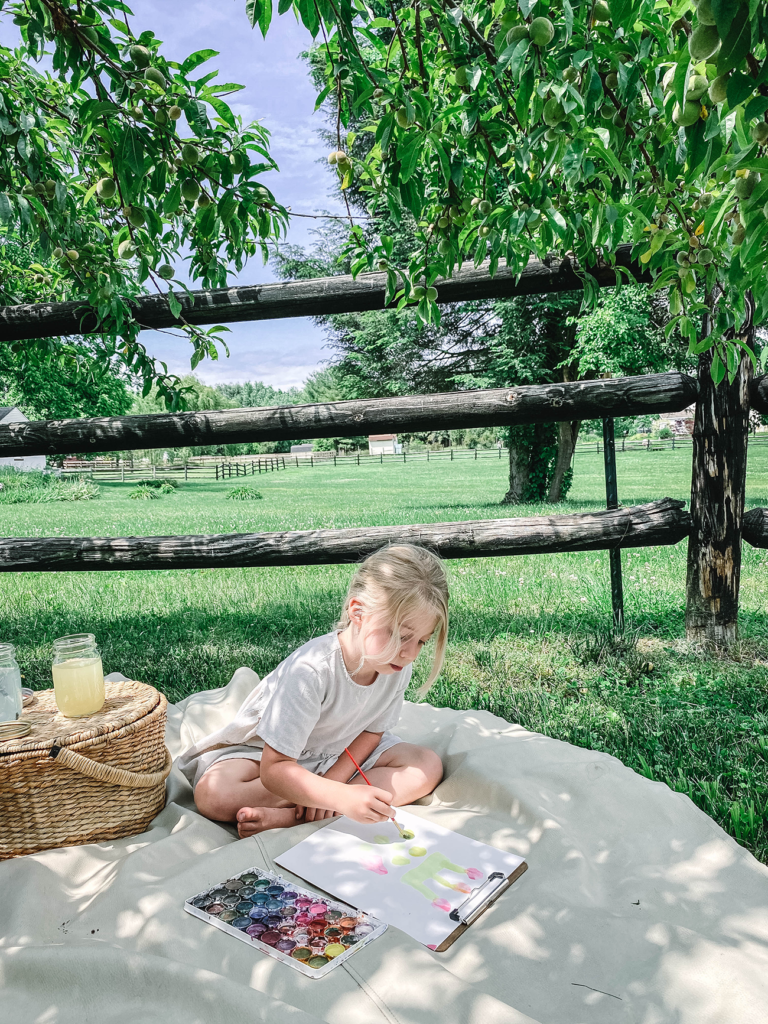 Naomi watercolor painting under the peach tree