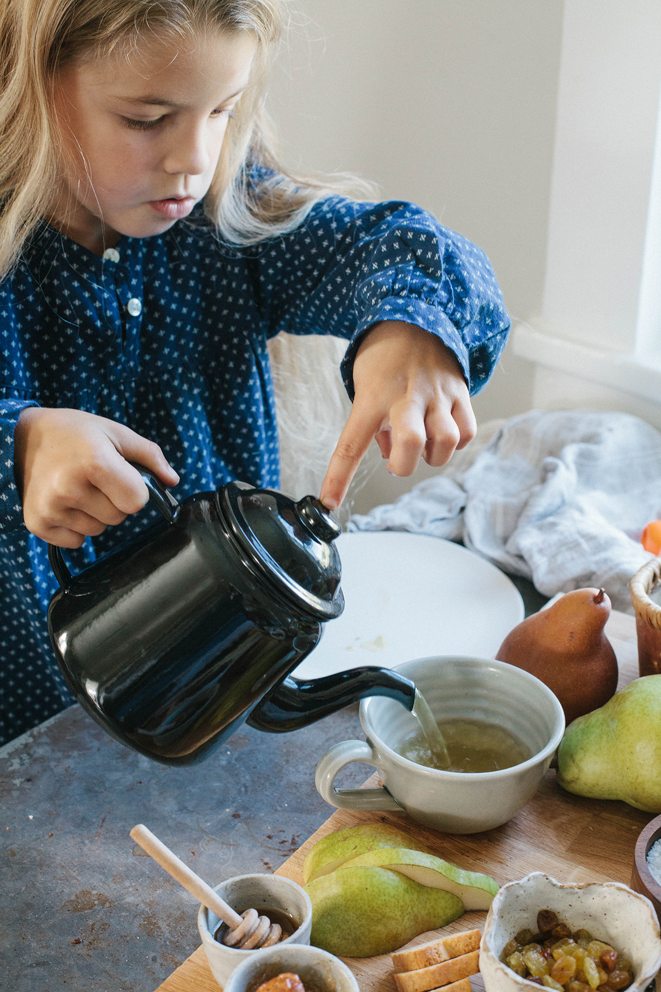 zoe pouring afternoon tea