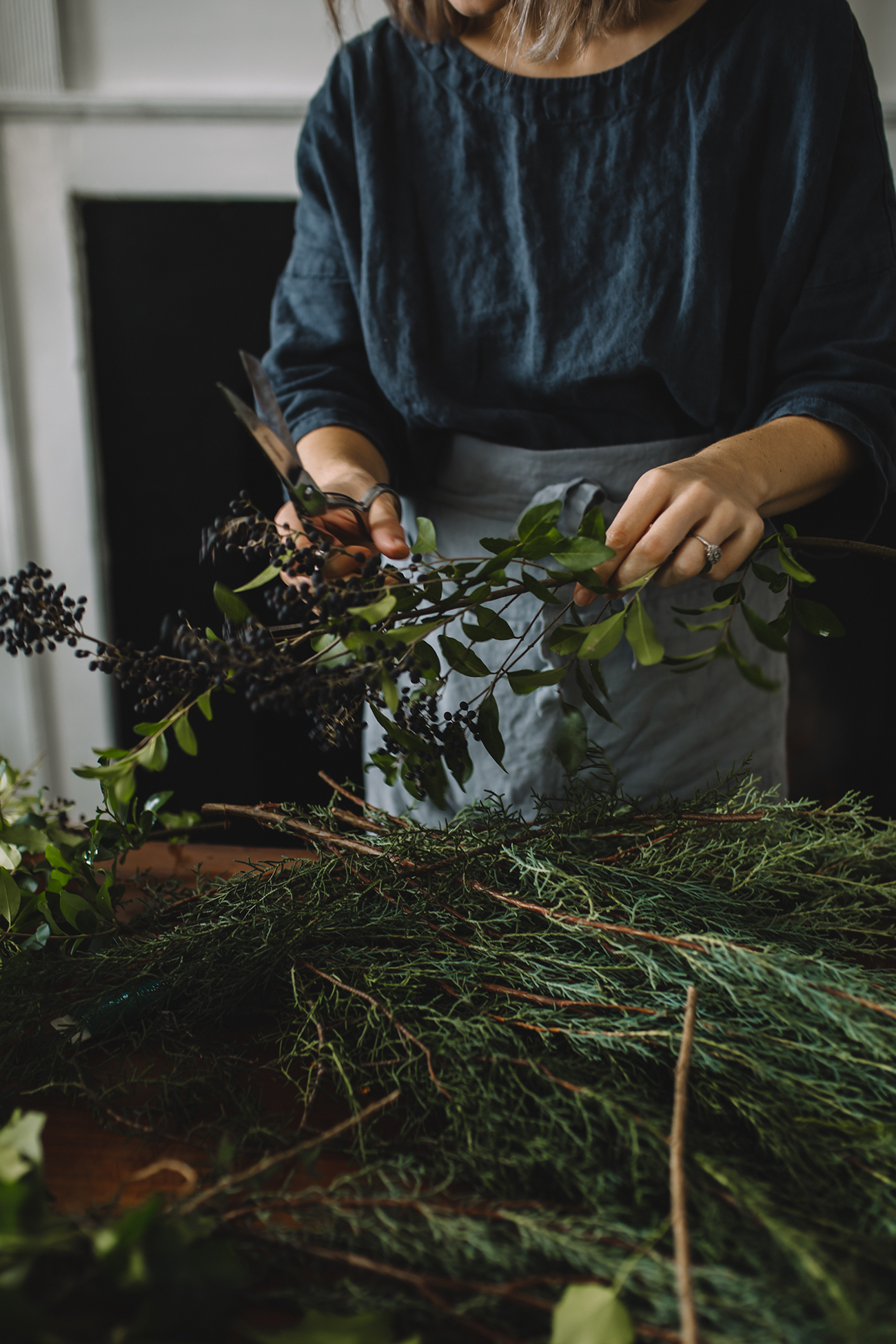 use foraged berries to decorate gifts as you are navigating holiday gift-giving