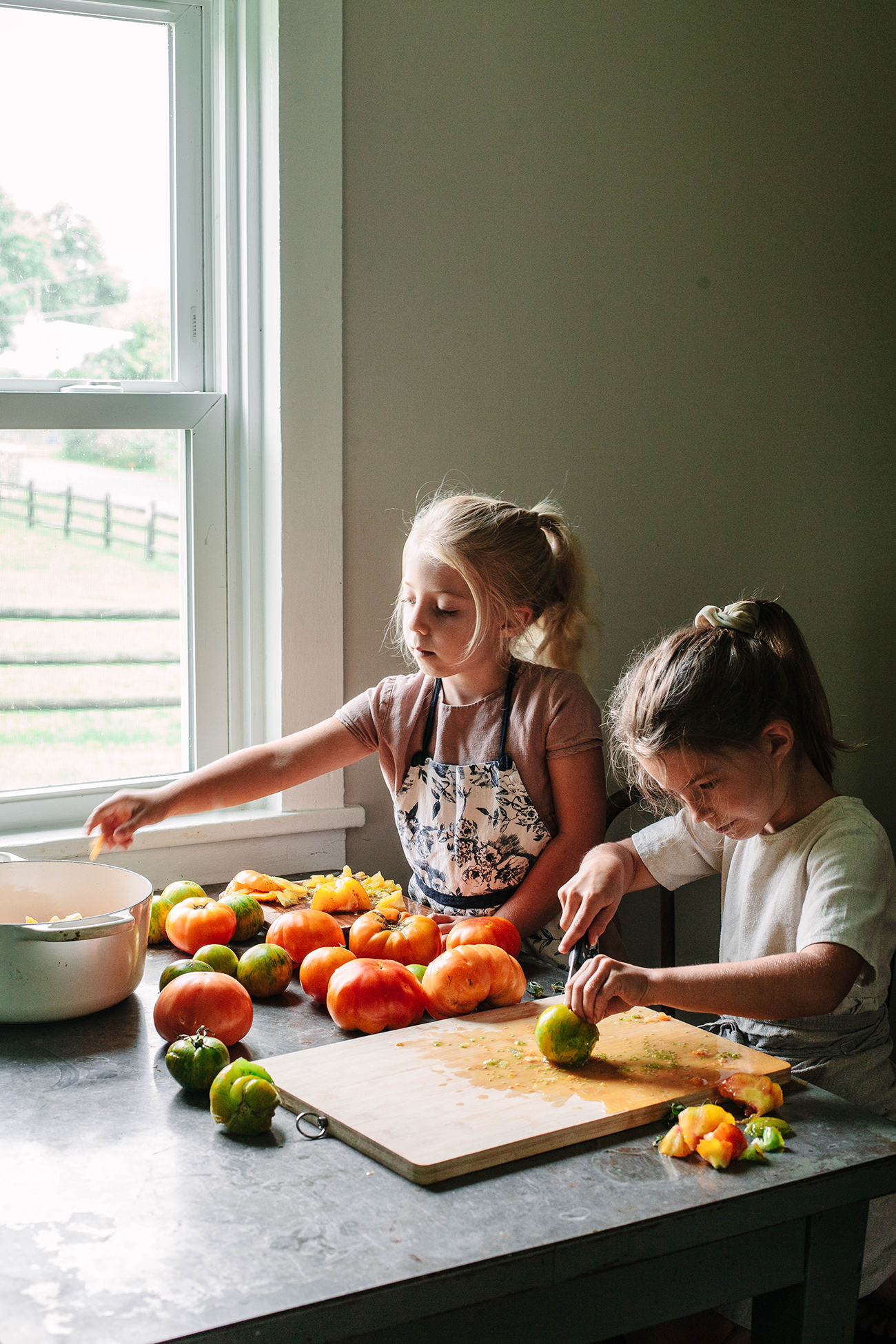 Chopping tomatoes for tomato sauce